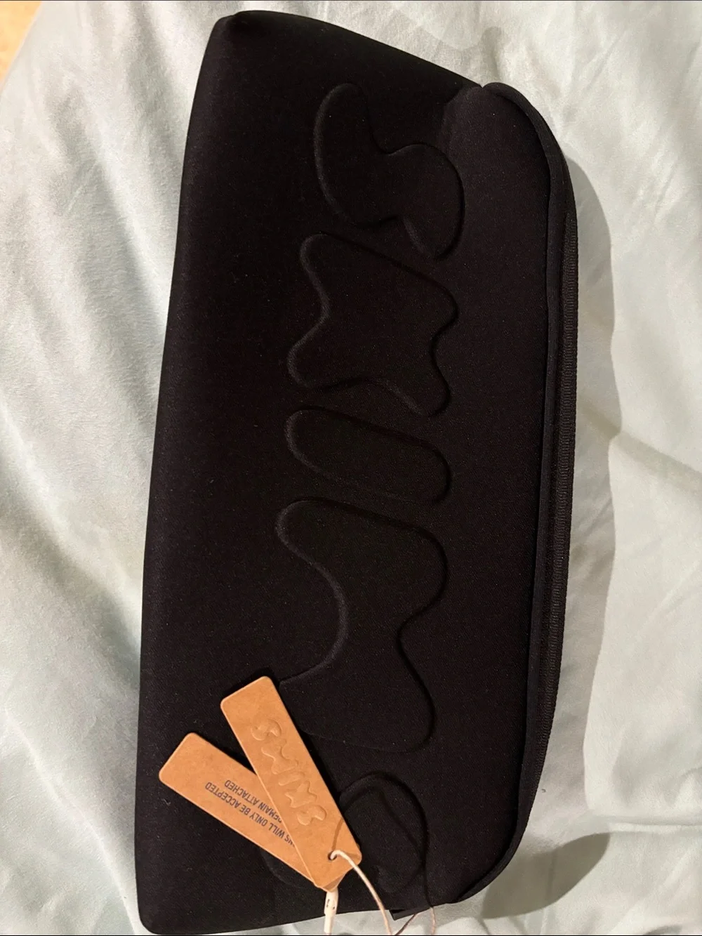 SKIMS Black Neoprene Cosmetic Pouch with Embossed Logo